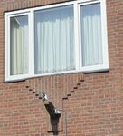 De oude hijsbalk is omgevormd naar een lamphouder.
<br/>
Richard Keijzer, 2015-08-13